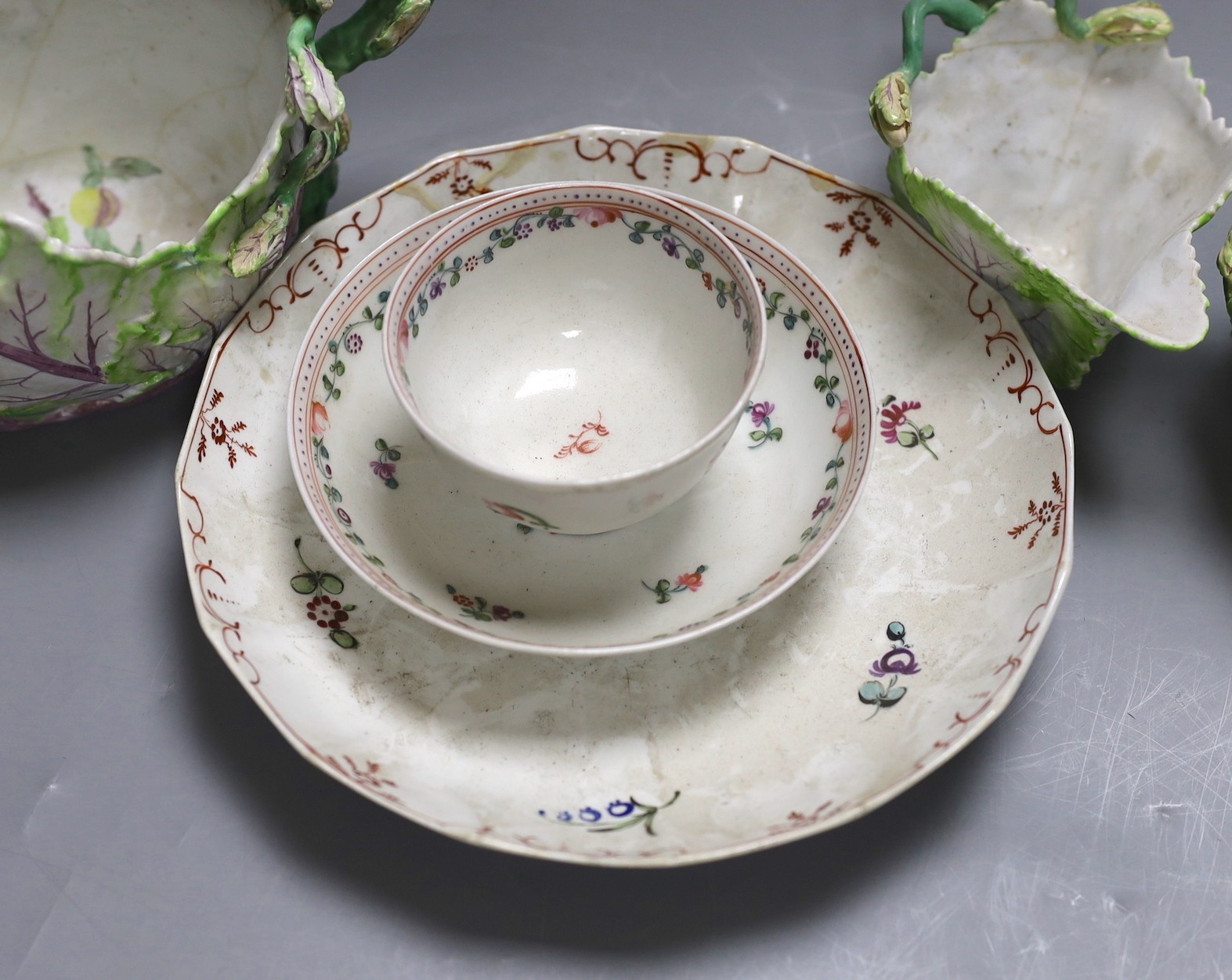 A Longton Hall cabbage leaf sauceboat and two similar creamboats, c.1755, faults and Newhall type tea wares, largest jug 22 cms wide